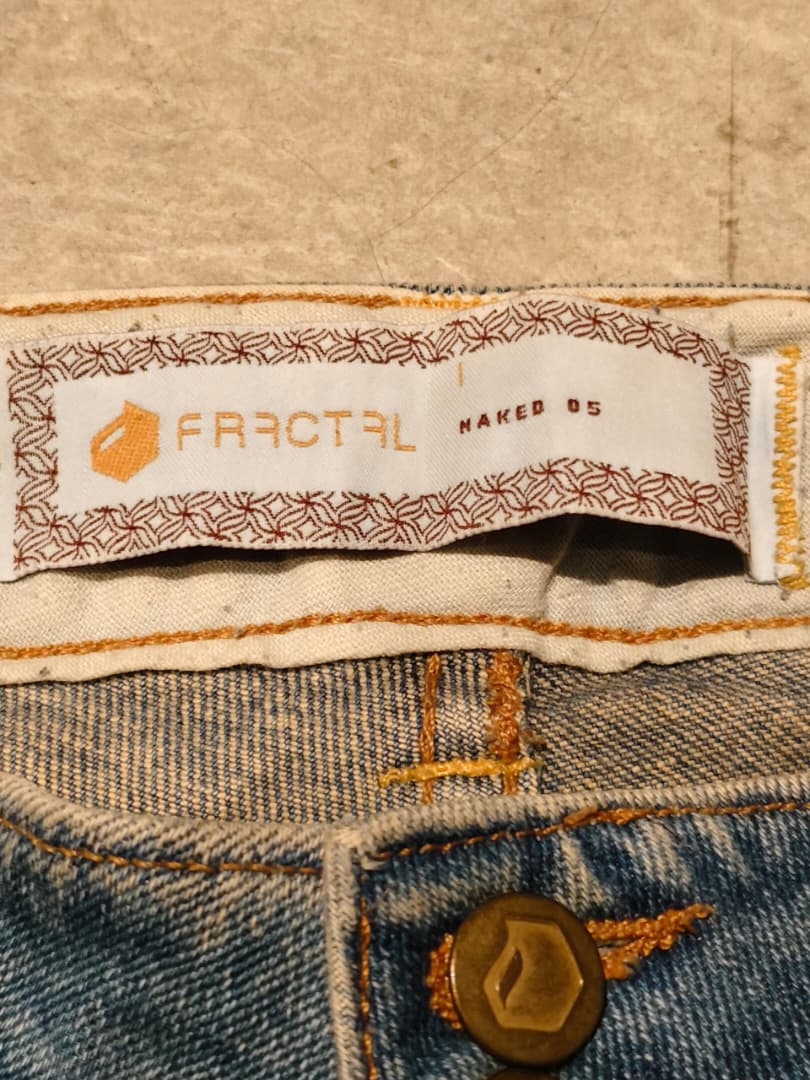 FRACTAL 'Naked 05' Low-Rise Flare – Double Brass Button, Raw Hem