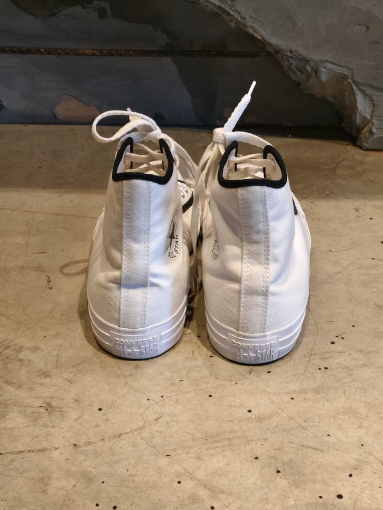 Front view of shoes in canvas showing the sole unit and upper silhouette
