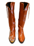 Front view of shoes in vegan leather cowboy boots showing the sole unit and upper silhouette