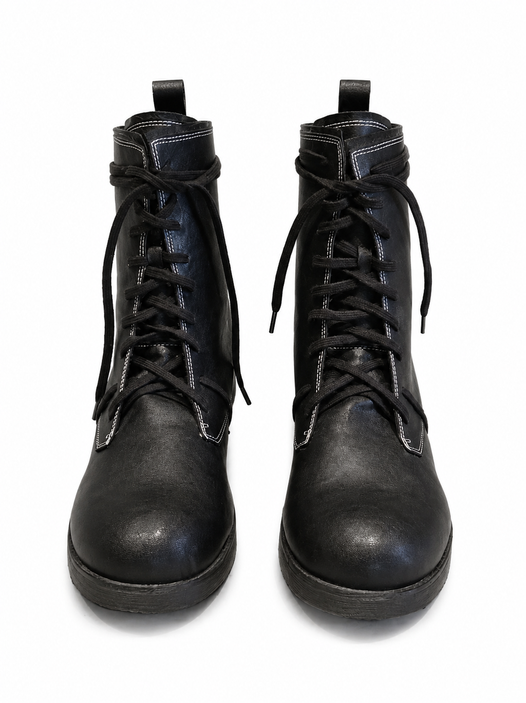 Front view of shoes in vegan leather showing the sole unit and upper silhouette