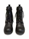 Front view of shoes in vegan leather showing the sole unit and upper silhouette