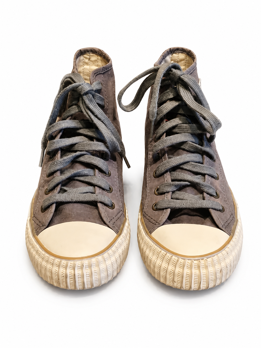Front view of shoes in grey canvas showing the sole unit and upper silhouette