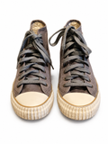 Front view of shoes in grey canvas showing the sole unit and upper silhouette