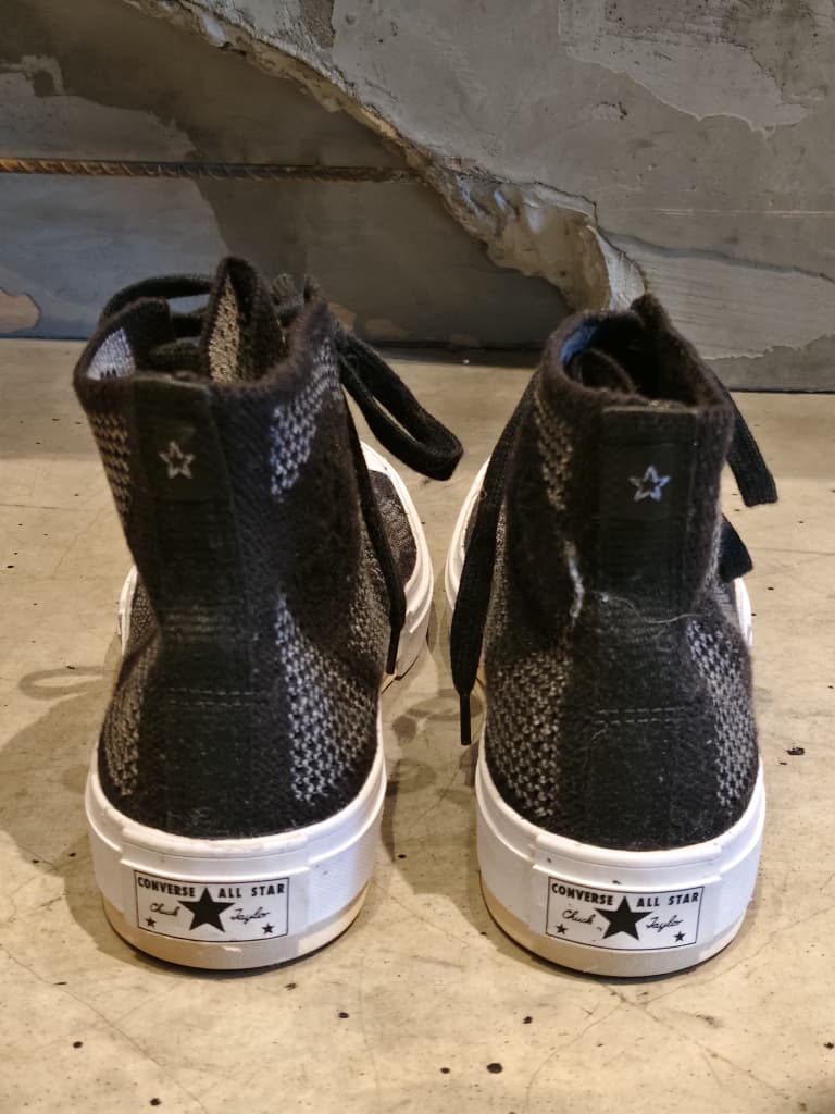 Front view of shoes in canvas showing the sole unit and upper silhouette
