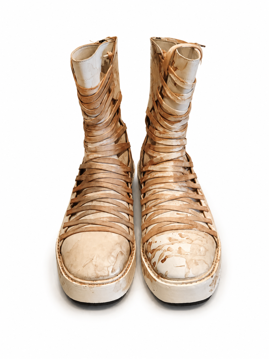 Front view of shoes in vegan leather showing the sole unit and upper silhouette